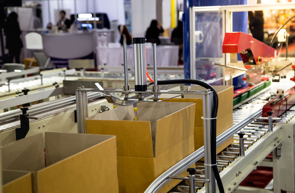 Máquina precintadora de cajas de cartón