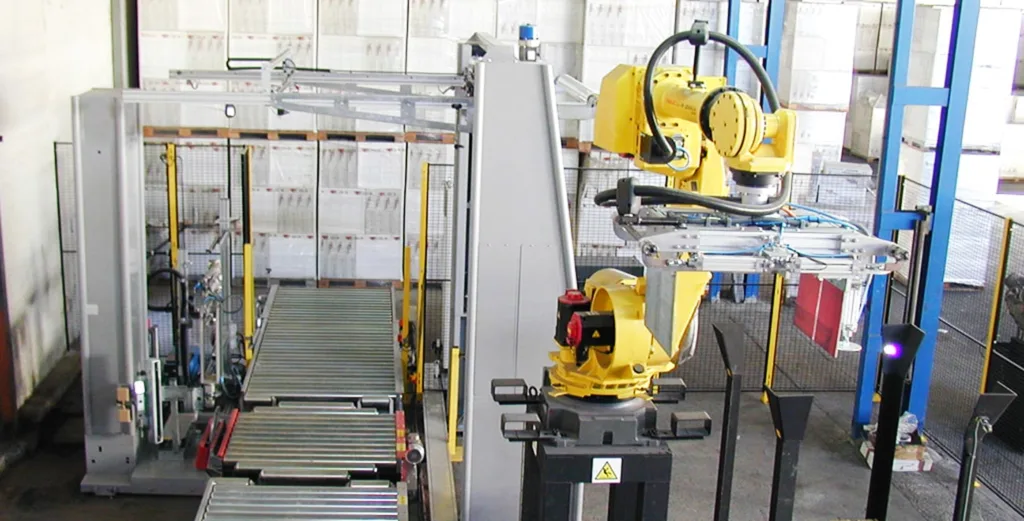 Robot paletizador industrial: máxima eficiencia y control 1 Linea de paletizado industrial con robot